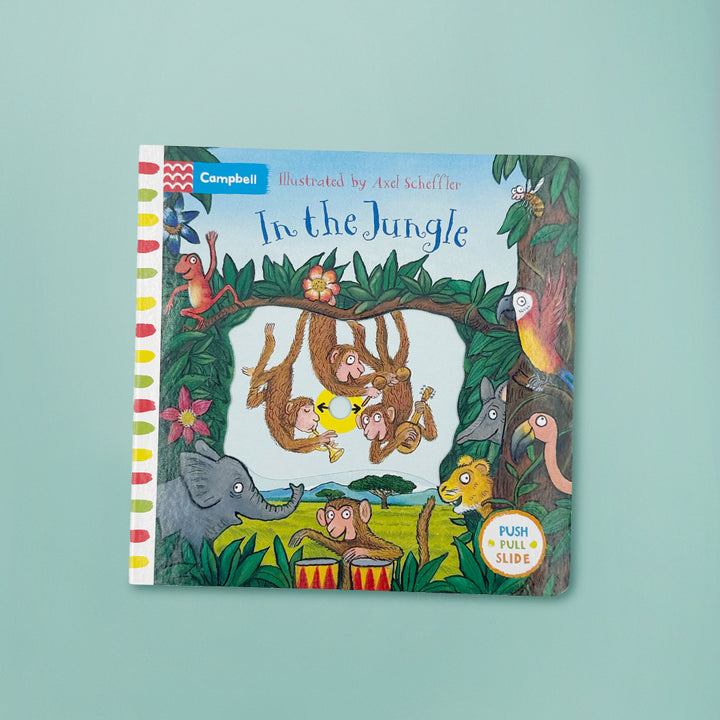 In the Jungle: A Push, Pull Slide Board Book 