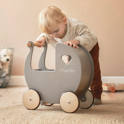 Moover grey dolls pram lifestyle shot